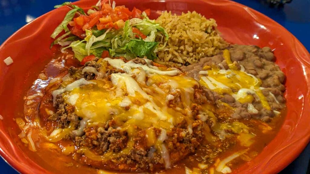 a stacked red chile enchilada plate at Pepper Pot in Hatch, NM during the Hatch Chile Festival
